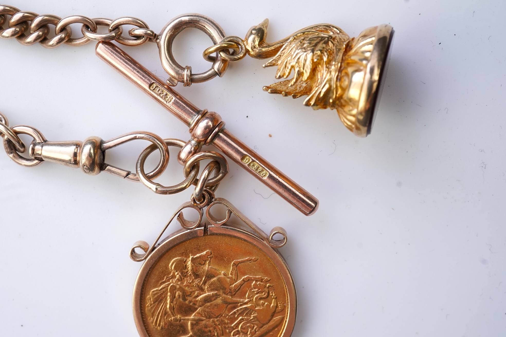 A gold Albert chain, sovereign coin pendant and fob seal, early 20th century